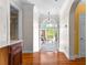Inviting foyer with hardwood floors, arched doorway, and decorative lighting at 1477 Highway 85 Connector, Brooks, GA 30205