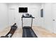 Home gym features travertine floors and plenty of space for workout equipment at 1477 Highway 85 Connector, Brooks, GA 30205