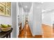 Bright hallway featuring wood floors, crisp molding, and access to multiple rooms at 1477 Highway 85 Connector, Brooks, GA 30205