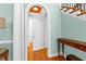 Elegant hallway featuring an arched doorway, hardwood floors, and detailed trim at 1477 Highway 85 Connector, Brooks, GA 30205