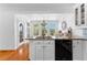Bright kitchen with granite countertop and eat-in area with backyard view at 1477 Highway 85 Connector, Brooks, GA 30205