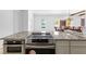 Elegant kitchen island featuring stainless-steel appliances and granite countertops at 1477 Highway 85 Connector, Brooks, GA 30205