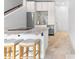 Charming kitchen island with granite countertops, seating for two, and stainless-steel appliances at 1477 Highway 85 Connector, Brooks, GA 30205