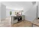 Spacious kitchen island with stainless-steel oven and microwave and open floor plan at 1477 Highway 85 Connector, Brooks, GA 30205