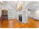 Cozy living room with fireplace, hardwood floors, and classic decor elements at 1477 Highway 85 Connector, Brooks, GA 30205