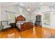 Spacious main bedroom featuring a vaulted ceiling, hardwood floors and natural light at 1477 Highway 85 Connector, Brooks, GA 30205