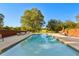 Inviting pool area with cozy seating and a serene ambiance, perfect for unwinding and entertaining guests at 1477 Highway 85 Connector, Brooks, GA 30205