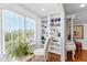 Bright sitting area featuring built-in bookshelves and a sunlit window at 1477 Highway 85 Connector, Brooks, GA 30205
