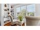 Cozy sitting area with built-in bookshelves, hardwood floors, and sun-filled windows at 1477 Highway 85 Connector, Brooks, GA 30205