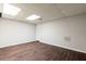 This room features laminate floors, a large window, and a closet at 170 Mark Nw Trl, Sandy Springs, GA 30328
