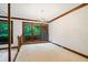 Bright dining room with wood trim and large windows offering scenic views at 170 Mark Nw Trl, Sandy Springs, GA 30328