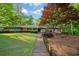 Charming single-story home with lush landscaping, a neatly manicured lawn, and a welcoming facade at 170 Mark Nw Trl, Sandy Springs, GA 30328