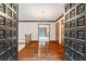 Inviting foyer with hardwood floors and detailed trim, showcasing an open view to the rest of the home at 170 Mark Nw Trl, Sandy Springs, GA 30328