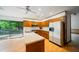 Well-lit kitchen with wood cabinetry, modern appliances, and deck access, perfect for entertaining and everyday living at 170 Mark Nw Trl, Sandy Springs, GA 30328