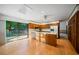 Bright kitchen with a large center island, abundant storage, and sliding glass doors to a deck area at 170 Mark Nw Trl, Sandy Springs, GA 30328