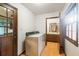 Functional laundry room with a washer and dryer, natural light, and easy access to a full bathroom at 170 Mark Nw Trl, Sandy Springs, GA 30328