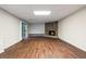The living room features laminate flooring, fireplace, and a sliding glass door at 170 Mark Nw Trl, Sandy Springs, GA 30328