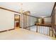Open-concept living area with natural light, wood trim, and views into the kitchen at 170 Mark Nw Trl, Sandy Springs, GA 30328