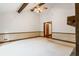 Spacious living room showcasing the vaulted ceiling, wood beams, and natural light at 170 Mark Nw Trl, Sandy Springs, GA 30328
