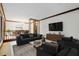 Stylishly furnished living room with a dining area and plenty of seating at 170 Mark Nw Trl, Sandy Springs, GA 30328