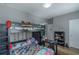 A room featuring a bunk bed, desk, and bookshelf at 1914 Coal Pl, Atlanta, GA 30318