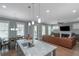 Spacious open-concept design with modern island, stainless appliances, and ample seating at 1914 Coal Pl, Atlanta, GA 30318