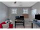 Modern home office space with two desks, natural light, and a comfortable seating area at 1914 Coal Pl, Atlanta, GA 30318