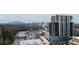 Panoramic aerial view showcasing a new high rise construction adjacent to existing buildings and city skyline at 2479 Peachtree Rd # 601, Atlanta, GA 30305