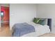 Cozy bedroom featuring a bed with decorative pillows and a neutral color palette at 2479 Peachtree Rd # 601, Atlanta, GA 30305