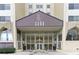 Building entrance with a modern glass facade and the name of the building above the entrance at 2479 Peachtree Rd # 601, Atlanta, GA 30305