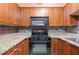 Well-equipped kitchen featuring granite countertops and stainless steel appliances at 2479 Peachtree Rd # 601, Atlanta, GA 30305