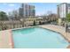 Inviting swimming pool area with clear water, surrounded by buildings at 2479 Peachtree Rd # 601, Atlanta, GA 30305
