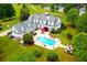 An aerial view of the pool and patio area outside the home at 1415 N Flat Rock Rd, Douglasville, GA 30134