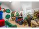 Attic storage space filled with storage containers, artificial plants, and other household items at 1415 N Flat Rock Rd, Douglasville, GA 30134