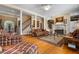 Open-concept living room with staircase and hardwood floors leading to the front entry at 1415 N Flat Rock Rd, Douglasville, GA 30134