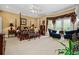 Spacious main bedroom with a four-poster bed, sitting area, and ample natural light at 1415 N Flat Rock Rd, Douglasville, GA 30134