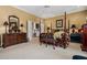 Spacious main bedroom with a four-poster bed, dresser, and ensuite bathroom access at 1415 N Flat Rock Rd, Douglasville, GA 30134