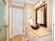Bathroom featuring tiled shower, vessel sink, with decorative fixtures at 1615 Mount Mckinley Dr, Grayson, GA 30017