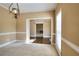Dining room with neutral walls, plush carpet and views to other rooms at 1615 Mount Mckinley Dr, Grayson, GA 30017