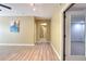 Inviting living room with hardwood floors, neutral paint, and open doorways to other rooms at 1615 Mount Mckinley Dr, Grayson, GA 30017