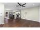 A brightly lit living room showcasing hardwood floors and an open-concept design at 1661 Barrett Nw Dr, Atlanta, GA 30318