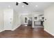 Open living area with hardwood floors seamlessly connecting to a modern kitchen at 1661 Barrett Nw Dr, Atlanta, GA 30318