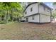 Home exterior showing the freshly landscaped yard and painted exterior at 353 Old Rosser Rd, Stone Mountain, GA 30087