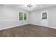 Dining room with new flooring, natural light, neutral paint and new door leading outside at 353 Old Rosser Rd, Stone Mountain, GA 30087