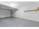 This garage features an epoxy floor, shelving and plenty of storage at 353 Old Rosser Rd, Stone Mountain, GA 30087