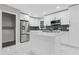 This bright kitchen is newly remodeled with stainless steel appliances and a center island at 353 Old Rosser Rd, Stone Mountain, GA 30087