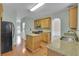 Modern kitchen featuring granite countertops, stainless steel appliances, and an adjacent breakfast nook at 5130 Hopewell Manor Dr, Cumming, GA 30028