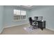 Comfortable office space with large window and ergonomic chair at 5130 Hopewell Manor Dr, Cumming, GA 30028