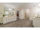 Spacious primary bathroom with double sinks, a walk-in shower, and tile floors at 5460 Lichenhearth Ct, Stone Mountain, GA 30087