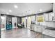 Well-equipped kitchen with a center island, stainless appliances, and dark gray walls at 5885 Raventree Ct, South Fulton, GA 30349